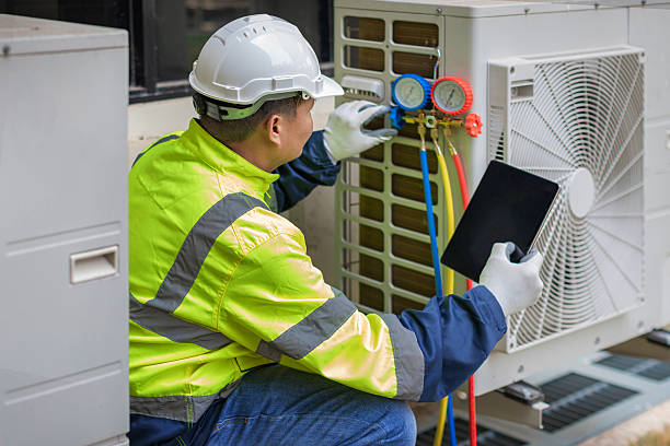 Professional Air Conditioning Repair technician working in Dowagiac, MI